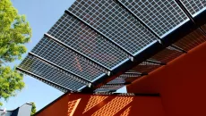 Photovoltaic roof structure in the main courtyard of the Heilig Geist church in the Höngg district of Zurich.