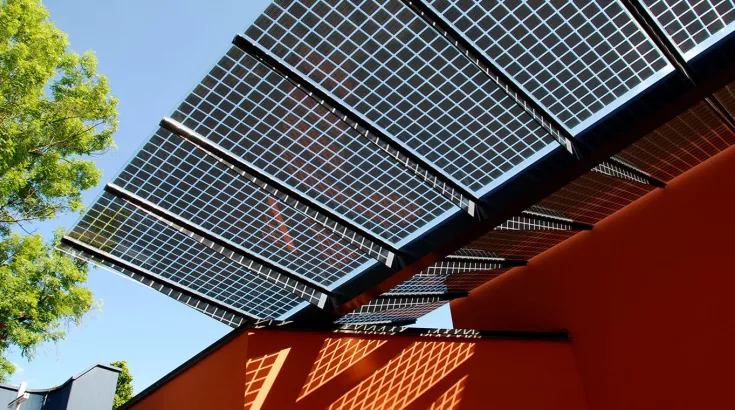 Photovoltaic roof structure in the main courtyard of the Heilig Geist church in the Höngg district of Zurich.