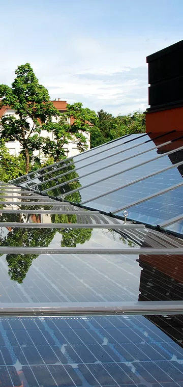 Close-up of the photovoltaic roof structure in the main courtyard of the Heilig Geist church.